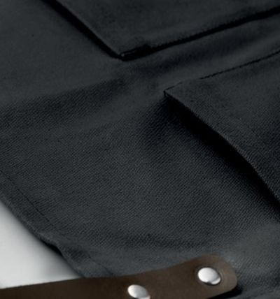 Apron in waxed canvas with leather details
